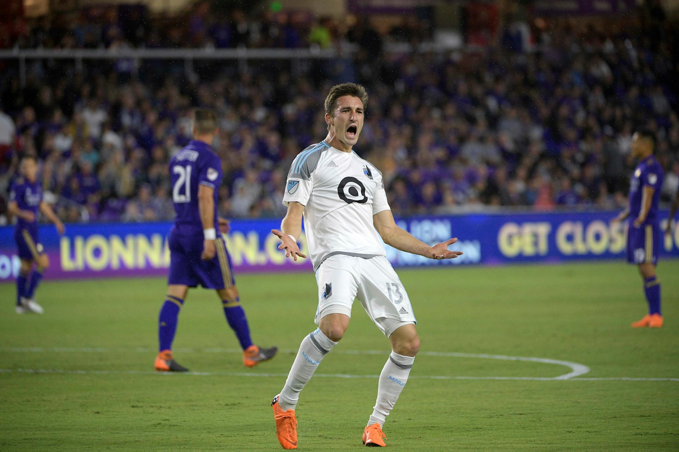 Minnesota United midfielder Ethan Finlay (13) celebrates after scoring a goal during the first half of an MLS soccer game against Orlando City Saturday, March 10, 2018, in Orlando, Fla. (Phelan M. Ebenhack for the Star-Tribune) ORG XMIT: OTKMINN101
