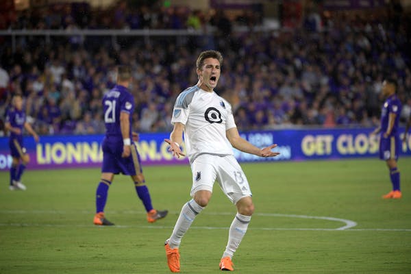 Minnesota United midfielder Ethan Finlay (13) celebrates after scoring a goal during the first half of an MLS soccer game against Orlando City Saturda