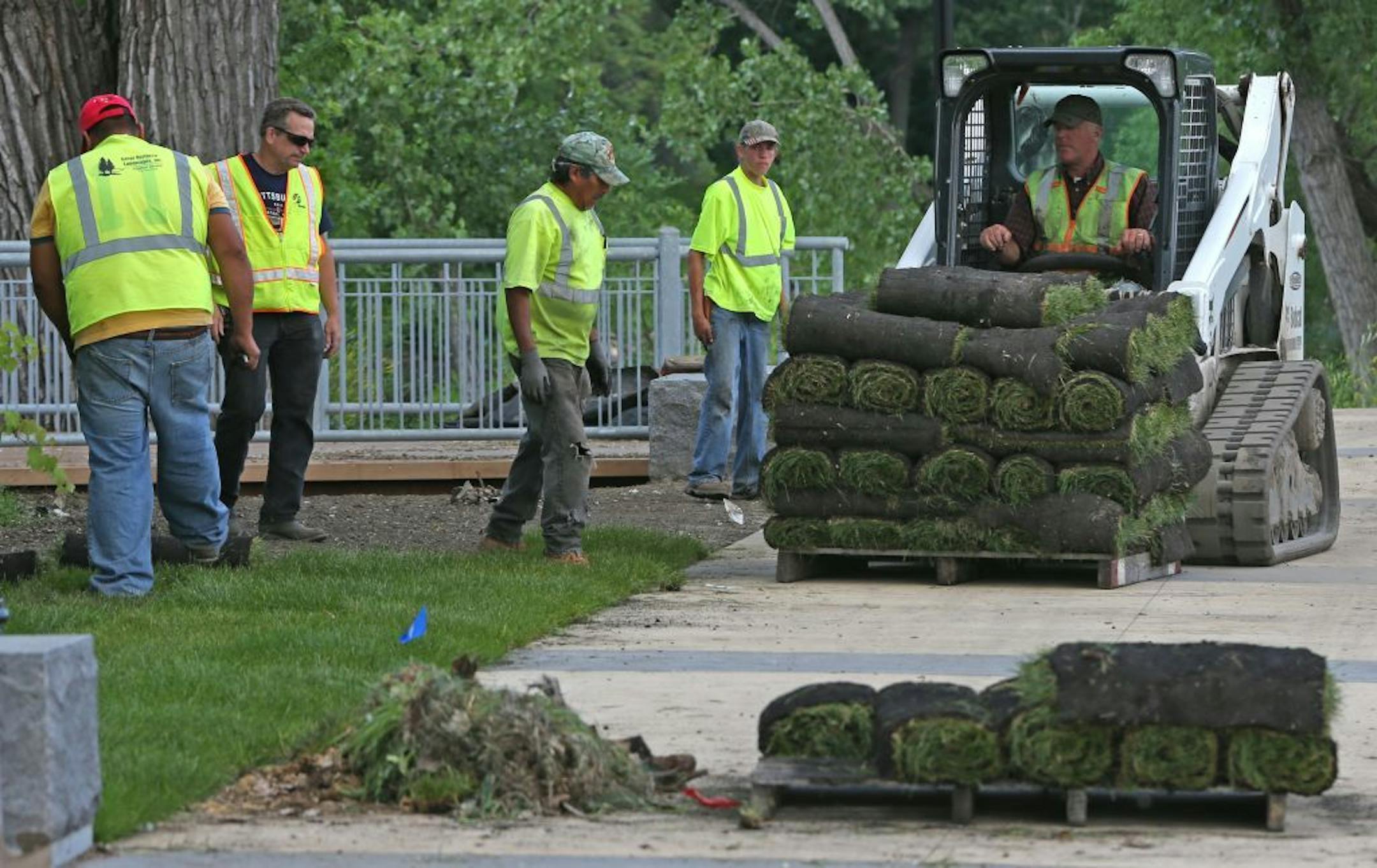 Landscaping crews put the finishing touches on the last, short link of the Rum River Regional Trail this week, winding up the year-long project in time for Riverfest Saturday in downtown Anoka. The decorative quarter-mile segment will run behind City Hall along the Rum to the existing paved bike trail three blocks north, said Greg Lee, city public services director. The $1.4 million project, nearly half covered by a federal transportation grant, will include two river overlooks, rain gardens wit