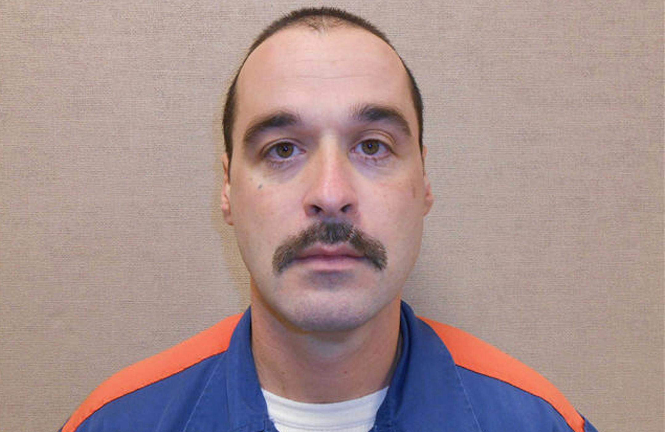Michael David Elliot. Elliot, who is serving life behind bars for murder in four 1993 deaths in Michigan, has escaped from prison and may have abducted a woman before she got away in Indiana, according to officials.