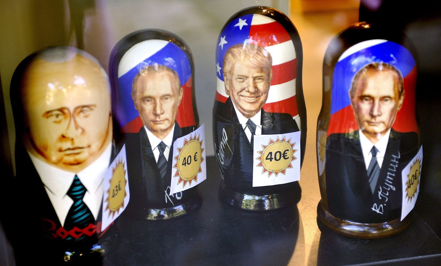 Russian Matryoshka dolls depicting Russian President Vladimir Putin and U.S. President Donald Trump are on sale in the Ruslania book store in Central Helsinki, Monday, July 9, 2018. Putin and Trump are scheduled to meet in Helsinki on Monday, July 16. (Timo Jaakonaho/Lehtikuva via AP)