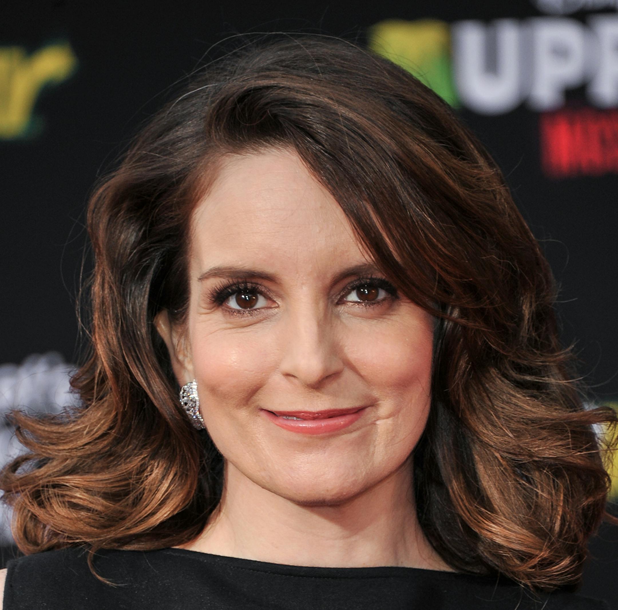 Tina Fey arrives at the World Premiere of "Muppets Most Wanted" on Tuesday, March 11, 2014, in Los Angeles. (Photo by Richard Shotwell/Invision/AP) ORG XMIT: INVW