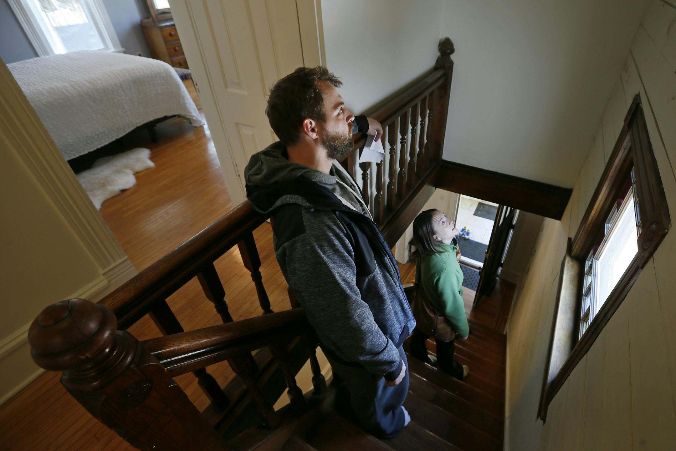 Luke Neville and Maggie Evavold looked at home during an open house at 950 23rd Avenue NE on Sunday . Jennifer Olstad of Keller Williams is hosting an open house at a property in Northeast Minneapolis that has been a rental for several years.With prices up, the owner of that house decided that now was a good time to sell. Sunday April 6, 2014 in Minneapolis , MN. ]JERRY HOLT jerry.holt@startribune.com