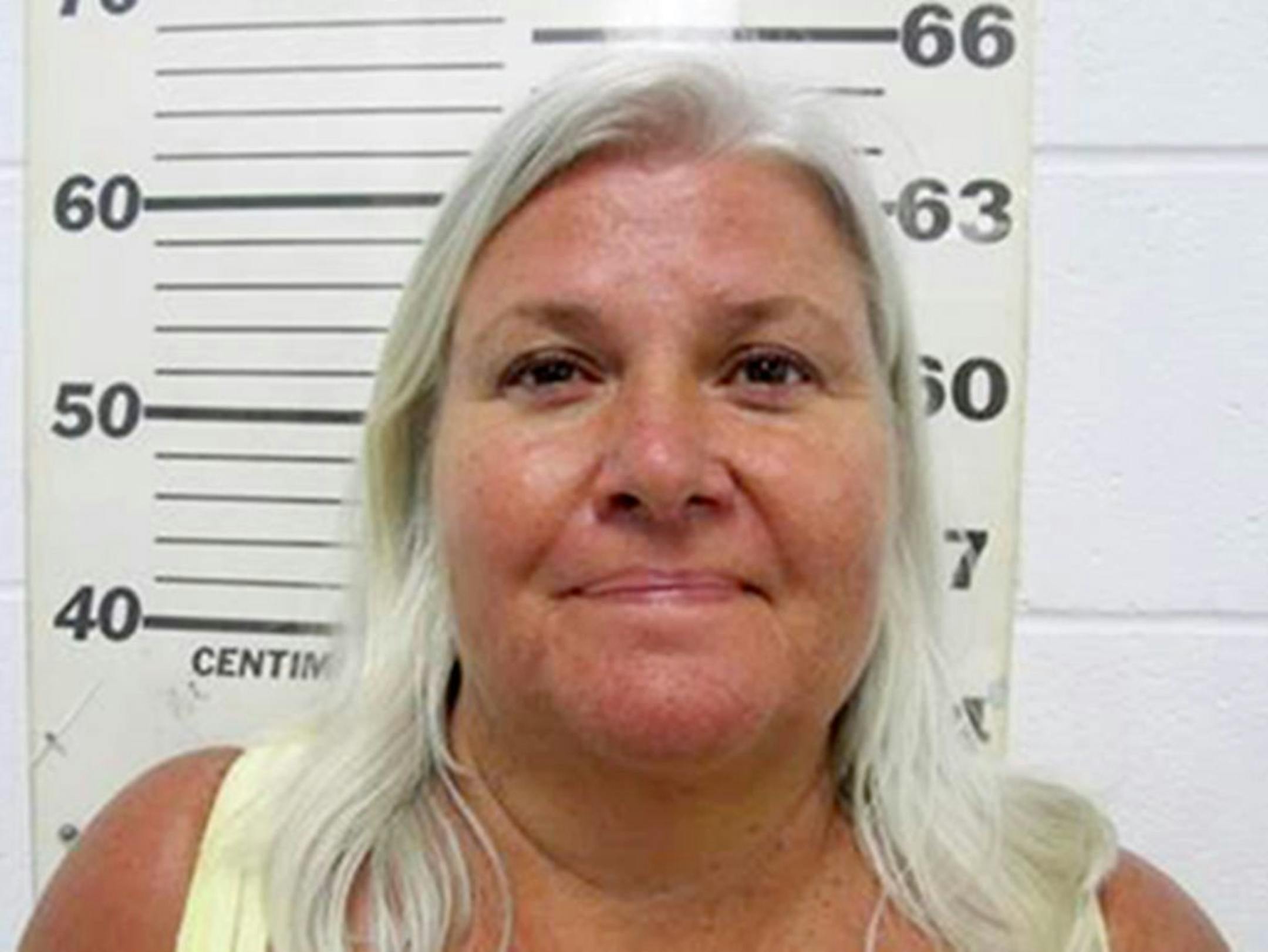 This photo provided by the South Padre Island (Texas) Police Department shows Lois Riess, of Blooming Prairie, Minn., who was arrested by federal deputy marshals Thursday, April 19, 2018.