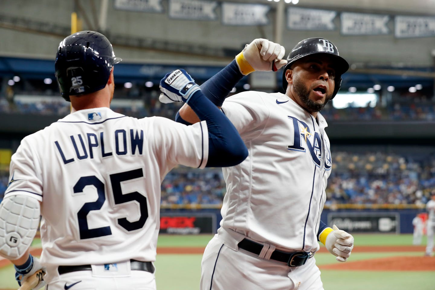 Tampa Bay's Nelson Cruz, right, celebrates with teammate Jordan Luplow after hitting a home run against the Twins during the fourth inning