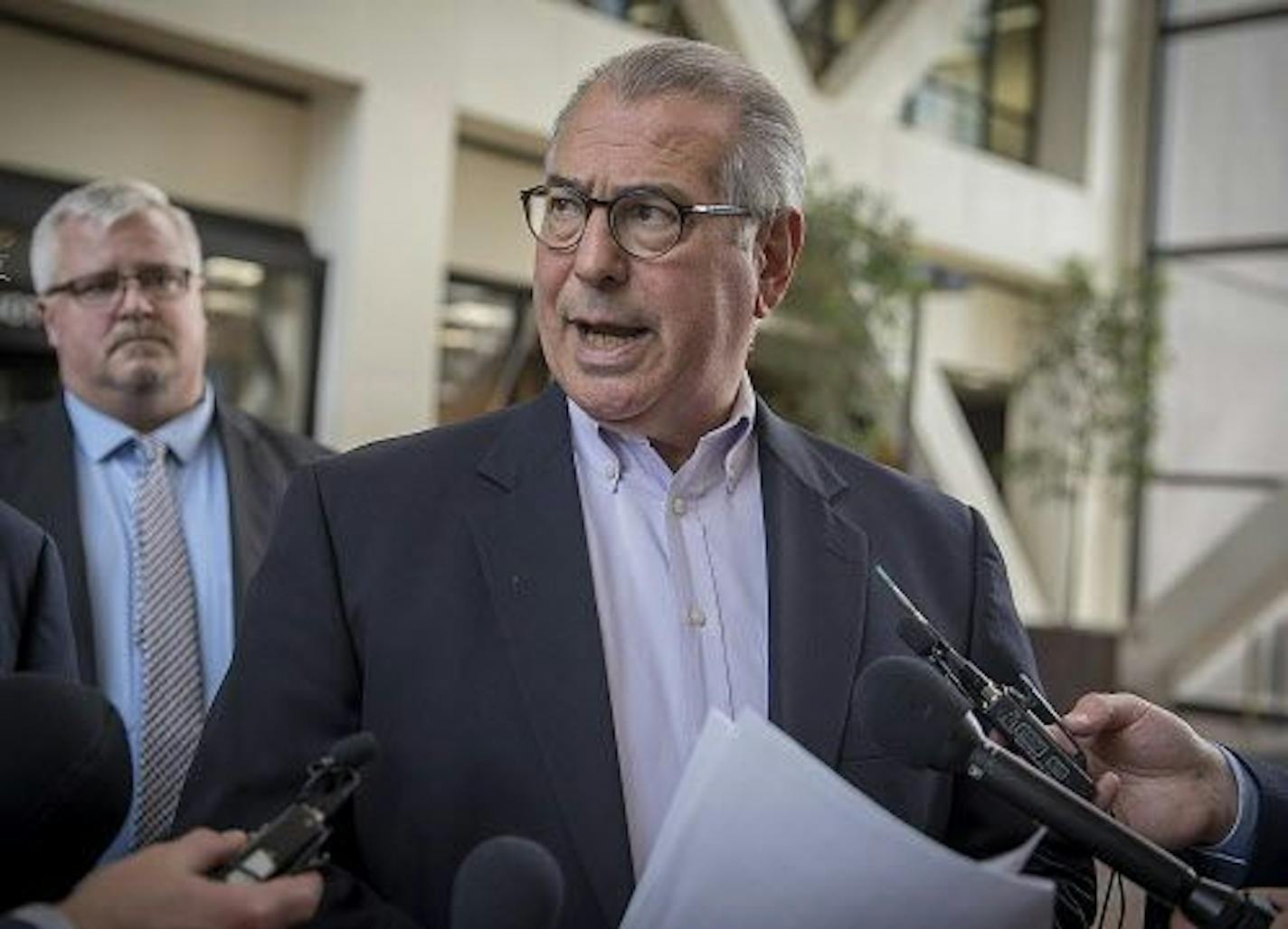 Hennepin District Attorney Mike Freeman, right, and Assistant Hennepin County Attorney Thad Tudor, left, addressed the media after Beth Freeman's sentencing at the Hennepin County Government Center, Friday, May 11, 2018.