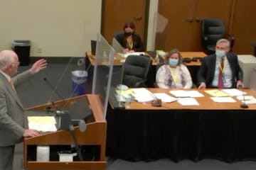 In this screen grab from video, defense attorney Earl Gray, left, points out his client while questioning a potential juror during the manslaughter tr