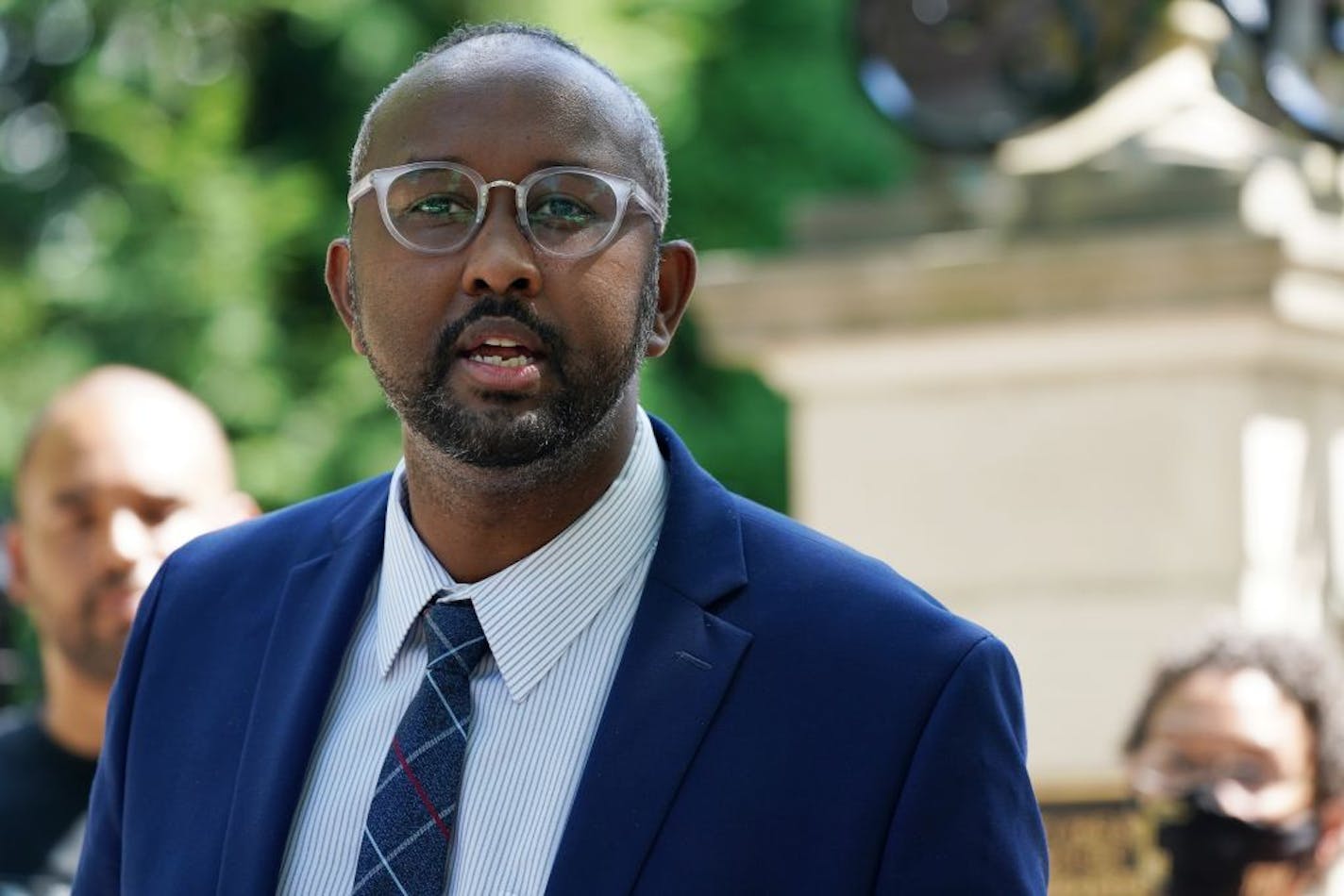 Jaylani Hussein, executive director of the Minnesota chapter of the Council on American-Islamic Relations, spoke during a press conference to denounce the reforms to the state's criminal justice system passed by the legislature Tuesday outside the Governor's Residence. The groups say the legislation is watered down and doesn't go far enough to address police accountability.