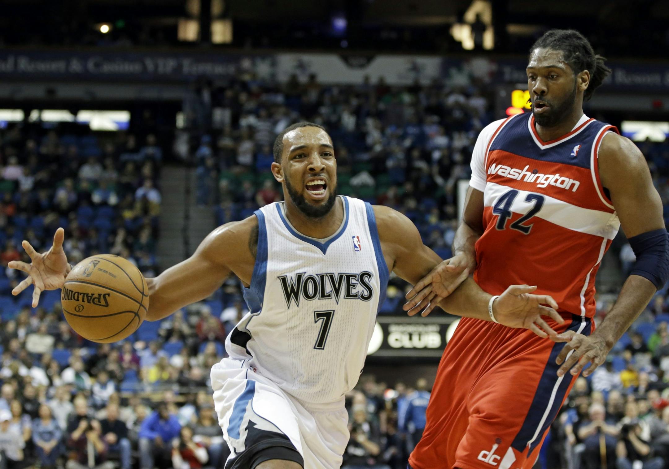 Timberwolves forward Derrick Williams, left, had his option picked up by the team for the 2014-15 season on Tuesday.
