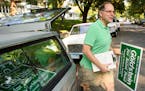 From the back of his 1991 Volvo, St. Paul mayoral candidate Tom Goldstein knocked on doors and distributed lawn signs in the Merriam Park neighborhood