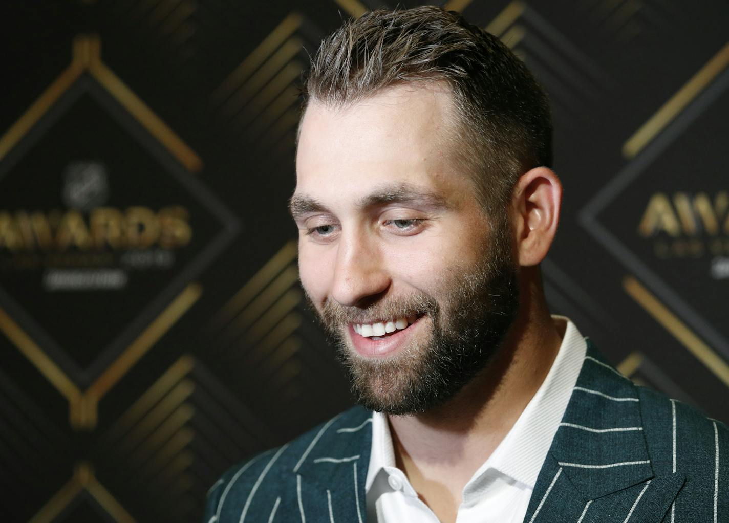 Jason Zucker of the Minnesota Wild speaks with the media during a news conference for the NHL Awards, Tuesday, June 18, 2019, in Las Vegas. (AP Photo/John Locher)