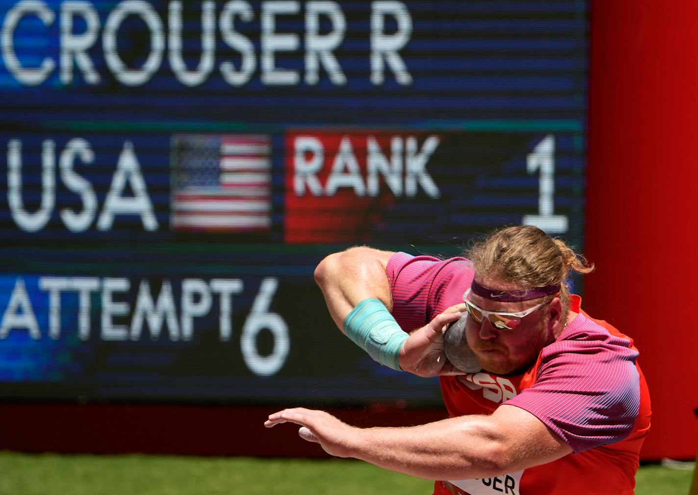 Ryan Crouser, of United States competes in the final of the men's shot put at the 2020 Summer Olympics, Thursday, Aug. 5, 2021, in Tokyo, Japan. (AP Photo/Charlie Riedel)