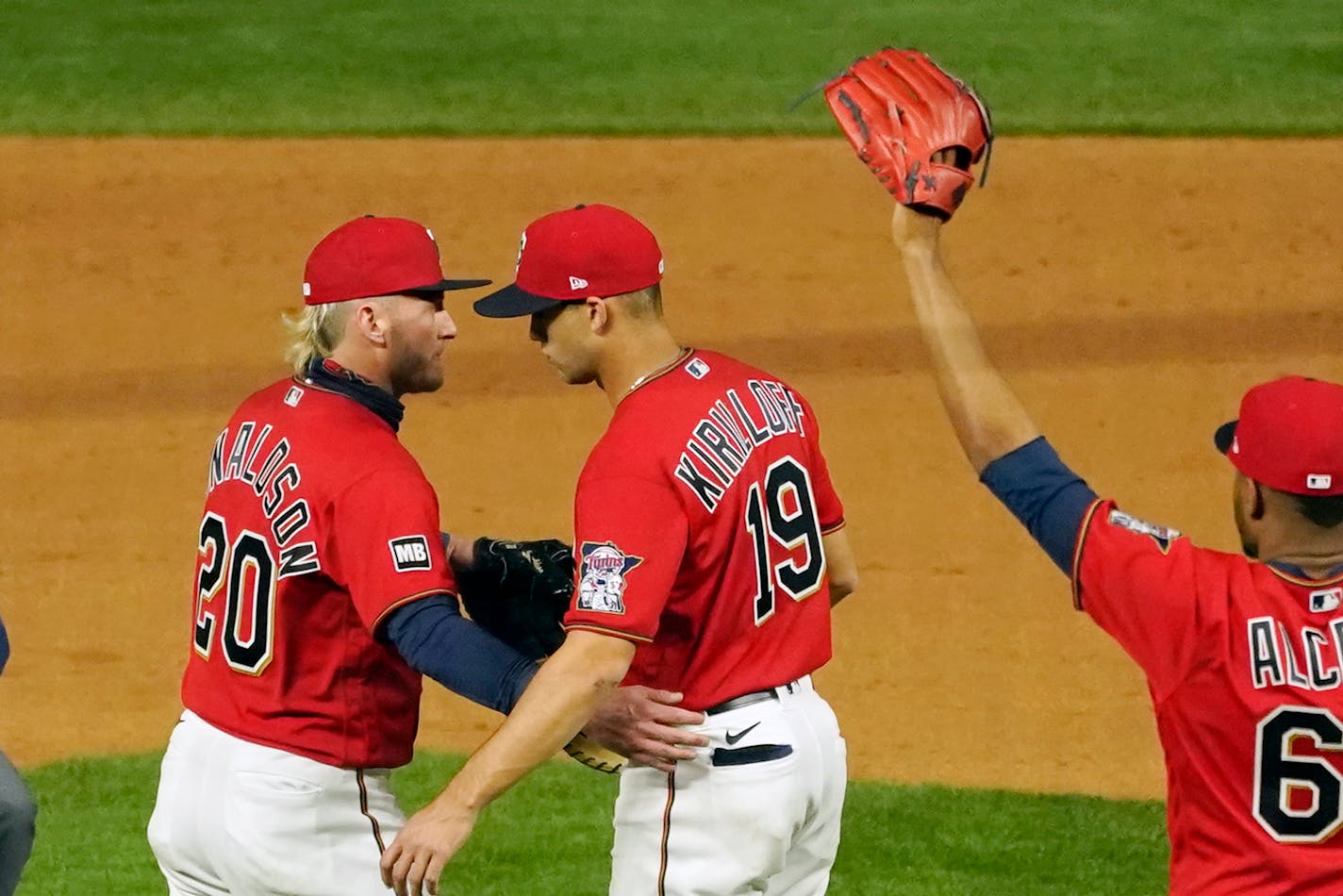 Twins first baseman Alex Kirilloff and Josh Donaldson celebrate after they defeated the Kansas City Royals