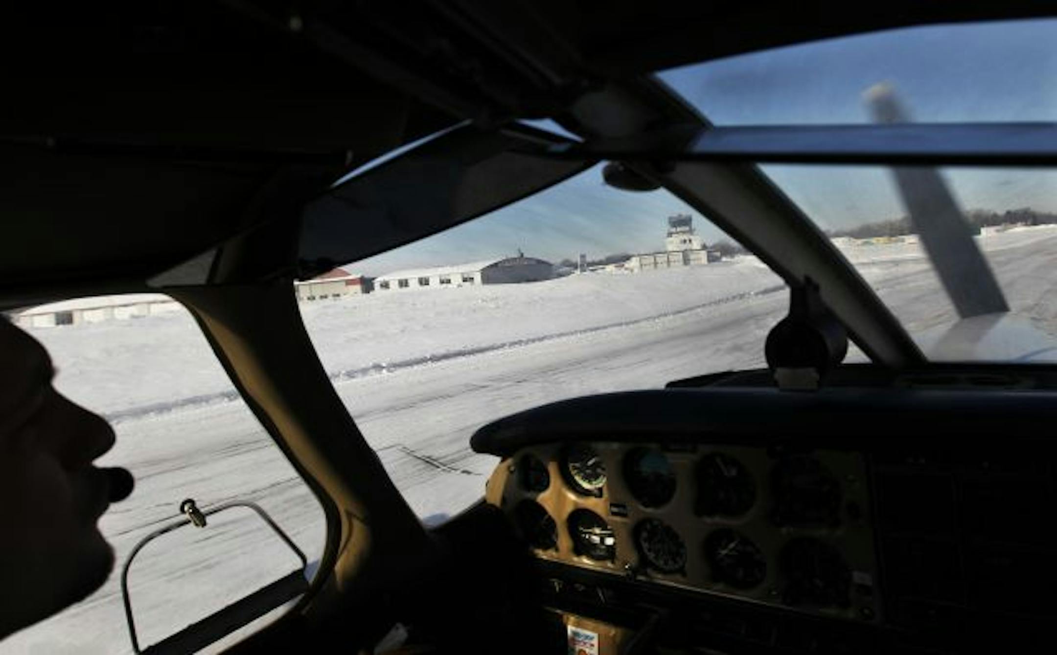 Operations manager Willie Gabbard landed after doing a fly-over of the Crystal Airport for photographs.