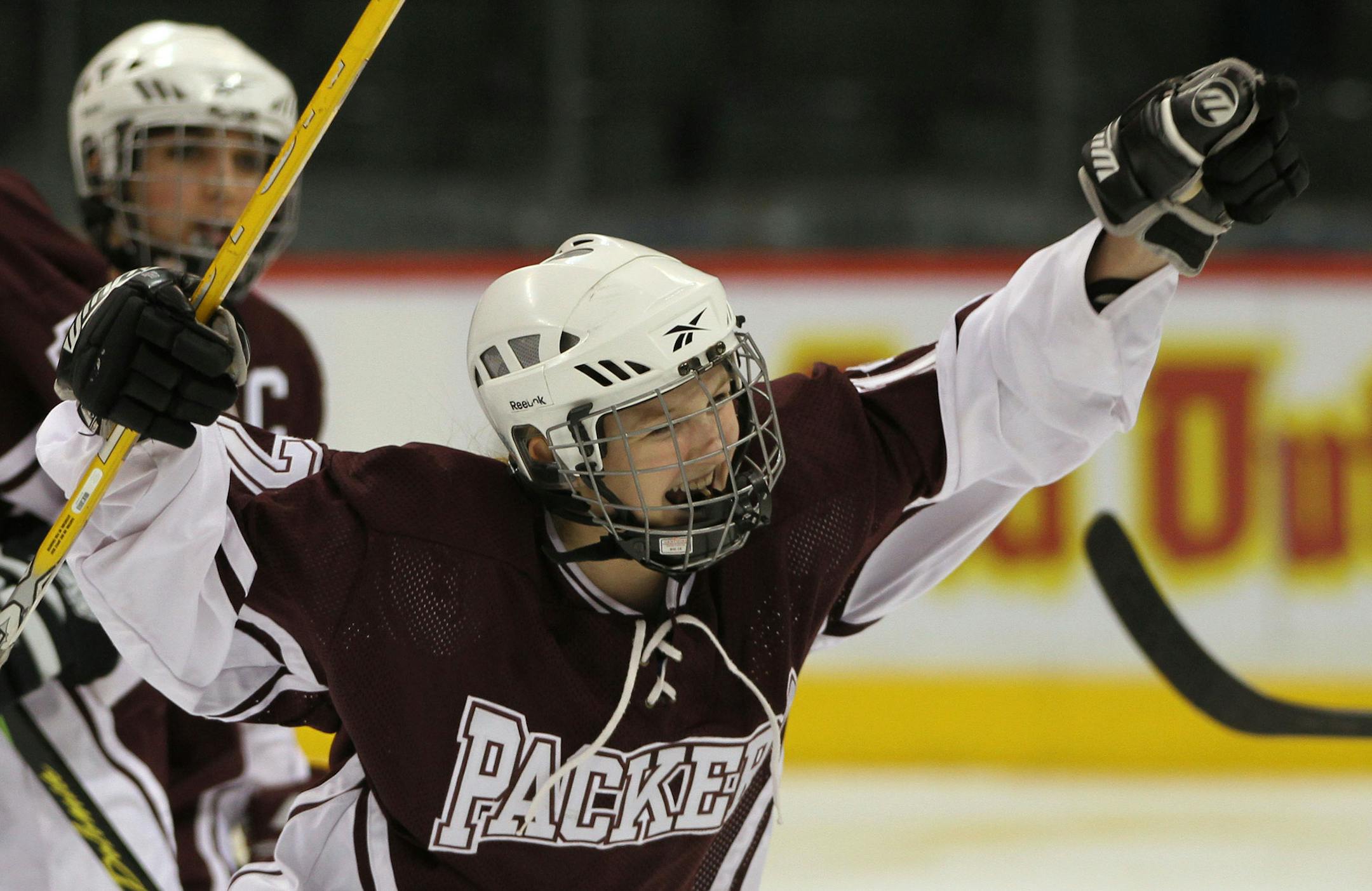 BRUCE BISPING ‚Ä¢ bbisping@startribune.com St. Paul, MN., Saturday, 2/26/11] Class A Championship Game, West St. Paul vs Warroad. (left to right) South St. Paul's Abby Palmquist celebrated after she scored a Packers goal in 2nd period action. ORG XMIT: MIN2013103015032757