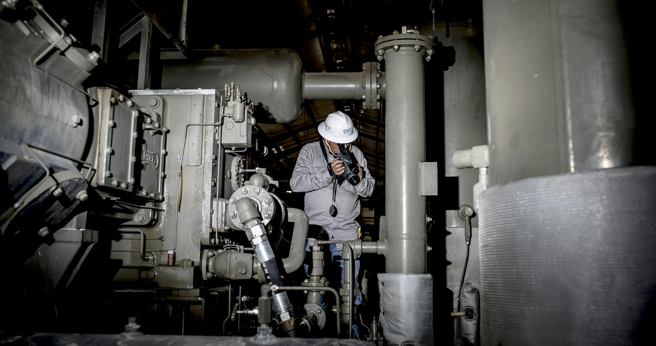 FILE -- A pipeline operator at Southwestern Energy uses an infrared camera to check for gas leaks, in Damascus, Ark., June 28, 2016. Some in the oil and gas industry reacted positively to the Trump administration&#x2019;s move to roll back methane-emissions rules, while others viewed it as a counterproductive measure that would sully the reputation of natural gas as a clean fuel. (Andrea Morales for The New York Times)