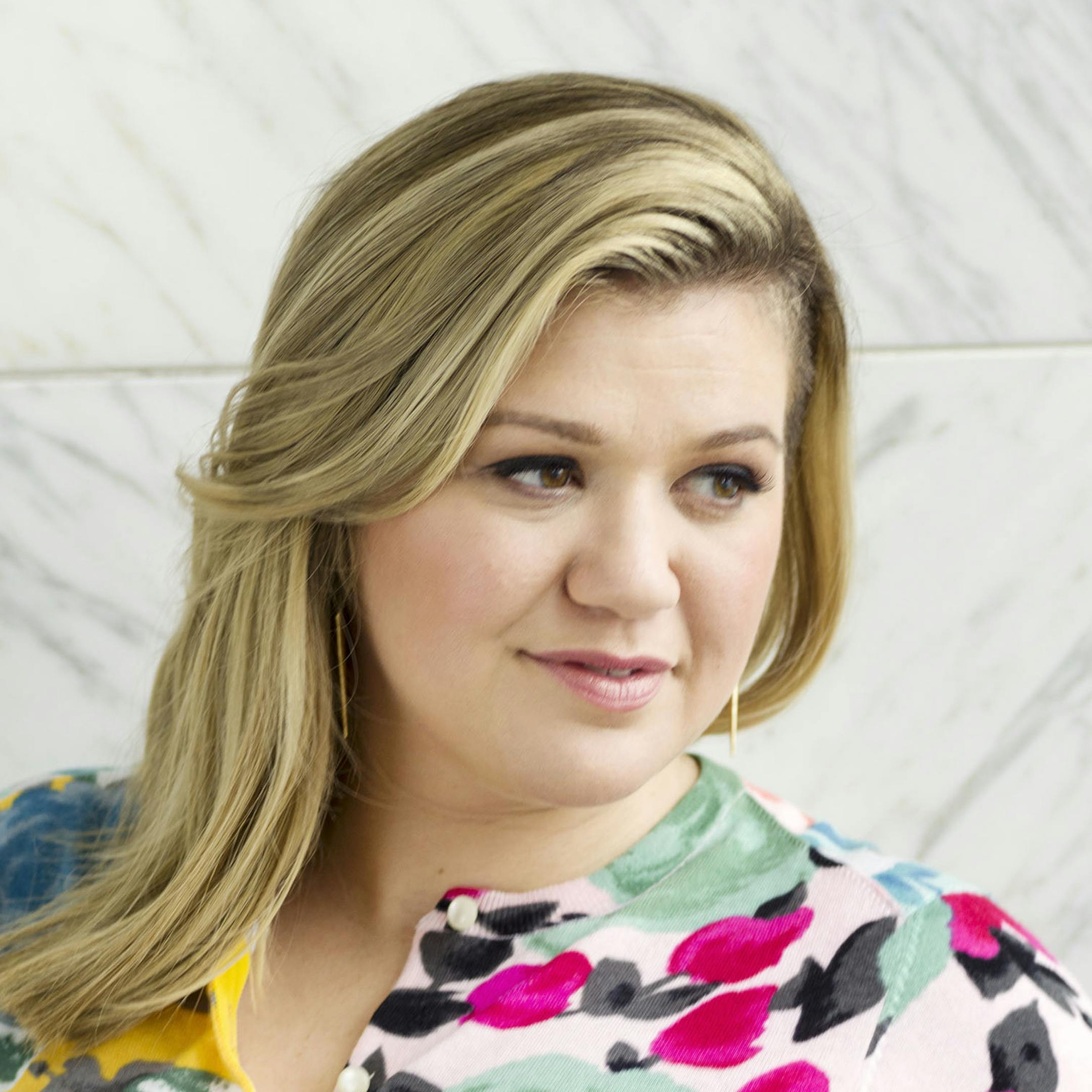 American singer and songwriter Kelly Clarkson poses for a portrait in promotion of her forthcoming album "Piece by Piece" at the Sony Club, on Wednesday, March 4, 2015 in New York. (Photo by Victoria Will/Invision/AP)