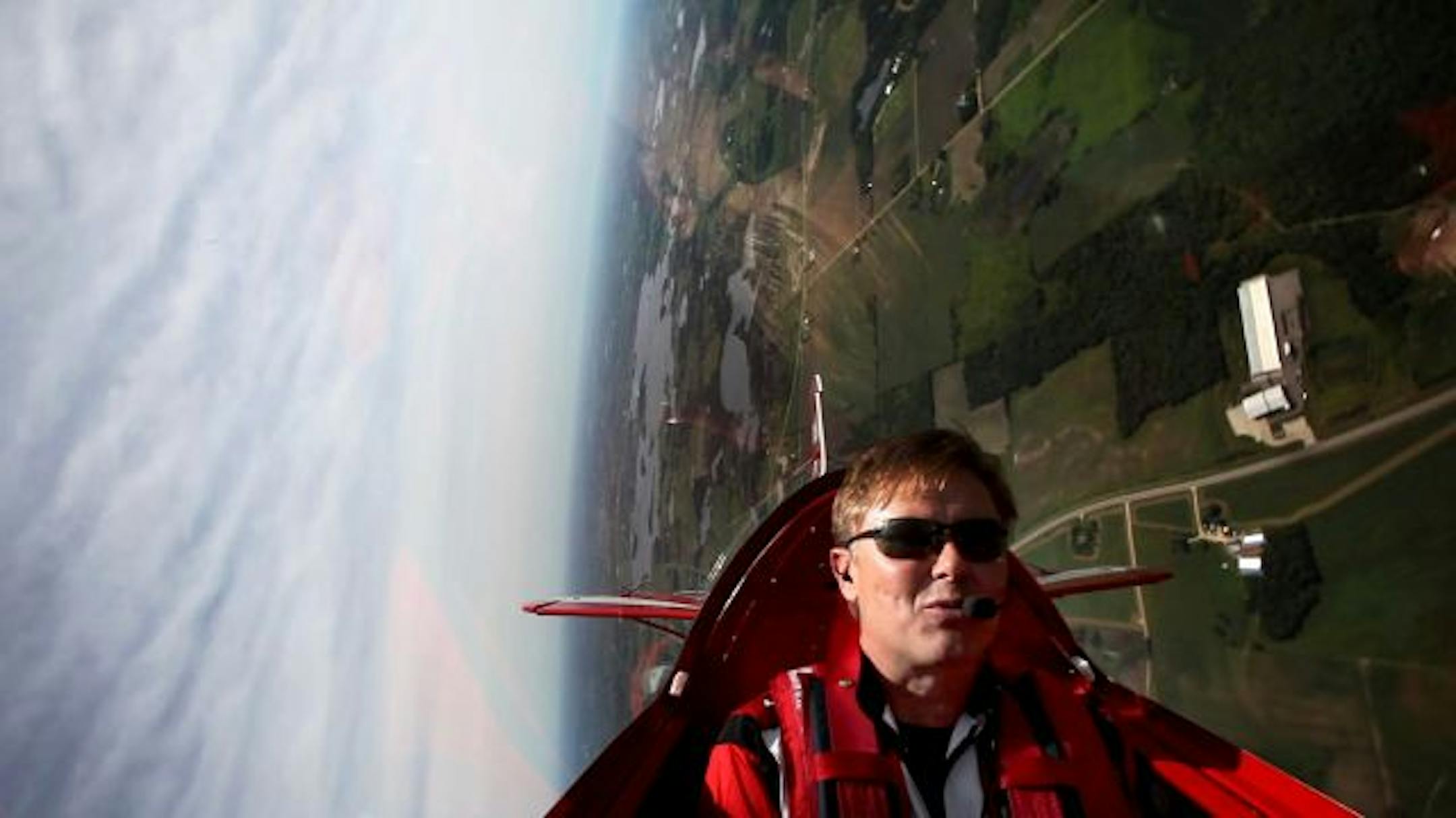 Michael Wiskus is in the middle of a roll in his Pitts S2C biplane that he uses for teaching aerobatics and for performing in air shows. He will be performing at the Minnesota Air Show in St. Cloud.