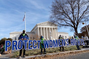 Abortion rights advocates demonstrate in front of the U.S. Supreme Court on Dec. 1, in Washington. 