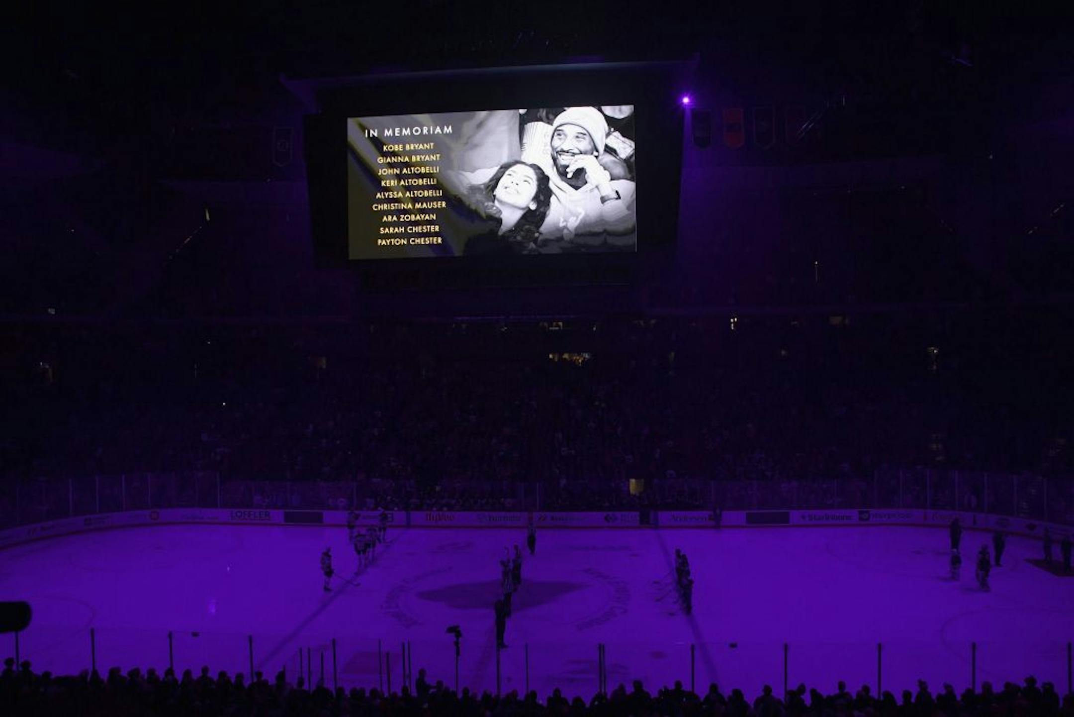 The Minnesota Wild and Boston Bruins observe a moment of silence for Kobe Bryant and the eight other people killed in a helicopter crash last week before an NHL hockey game Saturday, Feb. 1, 2020, in St. Paul, Minn.
