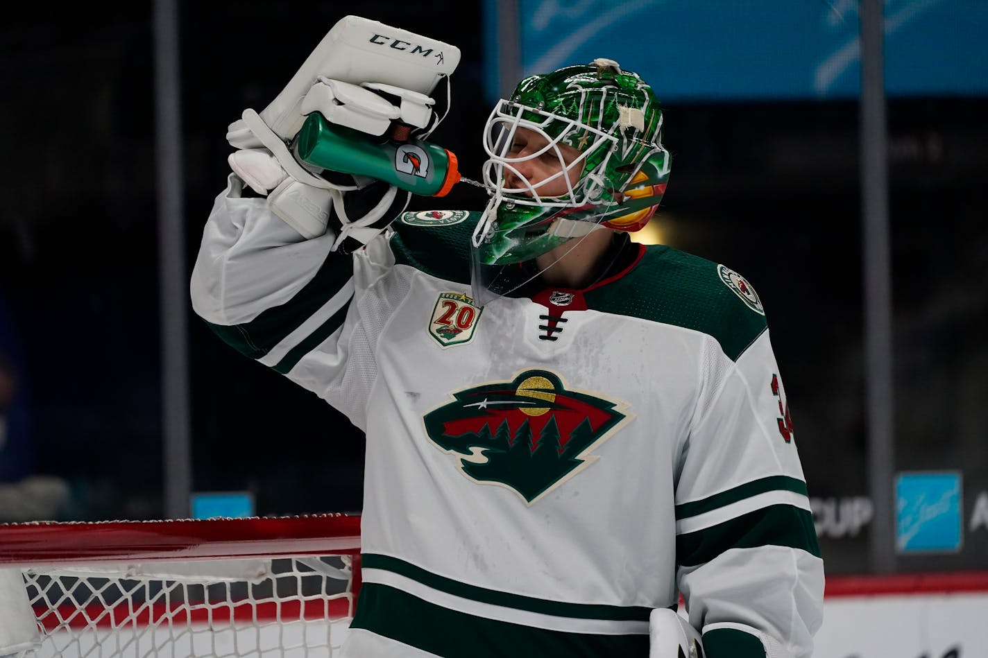 Minnesota Wild goaltender Kaapo Kahkonen (34) in the first period of an NHL hockey game Saturday, March 20, 2021, in Denver. (AP Photo/David Zalubowski)