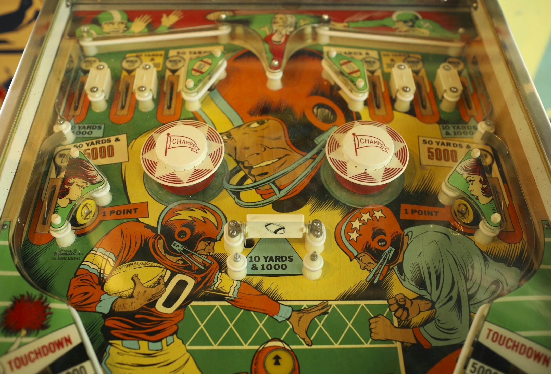 Detail of a football-themed Gottlieb model called Gridiron.