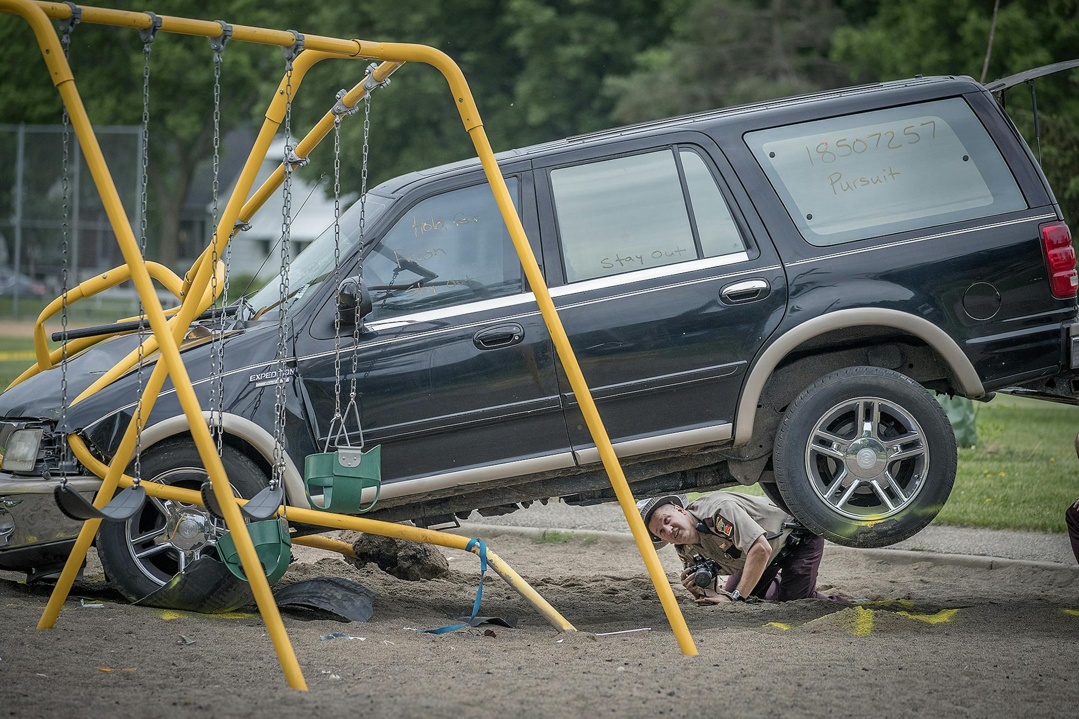 Minnesota State Patrol investigated the scene where a motorist being pursued by the State Patrol veered into a Minneapolis school playground and hit at least one child, Monday, June 11, 2018.