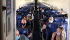 Masked passengers fill a Southwest Airlines flight from Burbank, Calif., to Las Vegas on June 3, with middle seats left open. (Christopher Reynolds/Lo