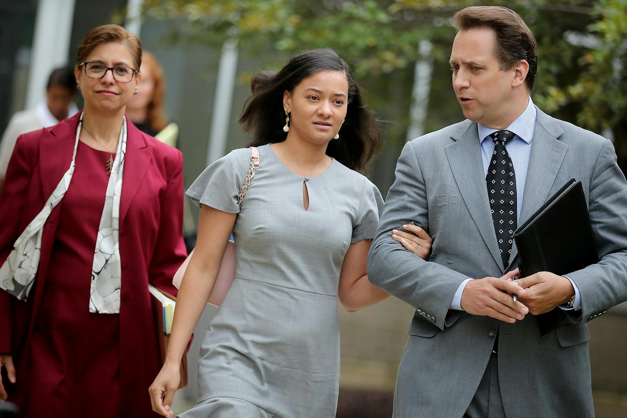 Brianna Nelson, center, left the Carver County Carver District Court in Chaska along with her attorney Eric Stoltman on Thursday.