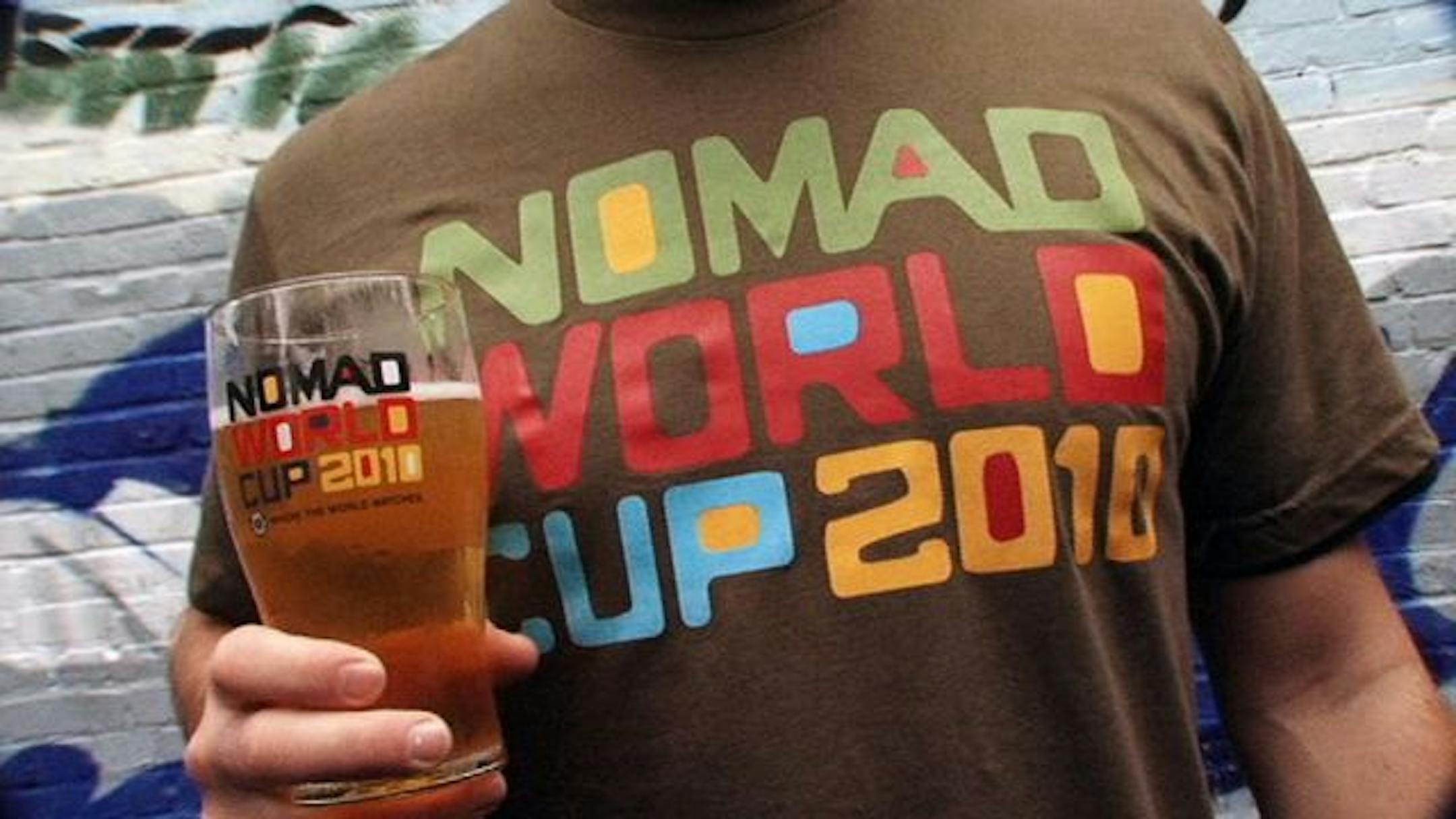 A bargoer showed off the Nomad's World Cup-themed T-shirt and beer glass.