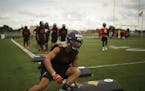 Osseo High School linebacker/safety and co-captain Nick Norman performed a drill during a 2016 practice.