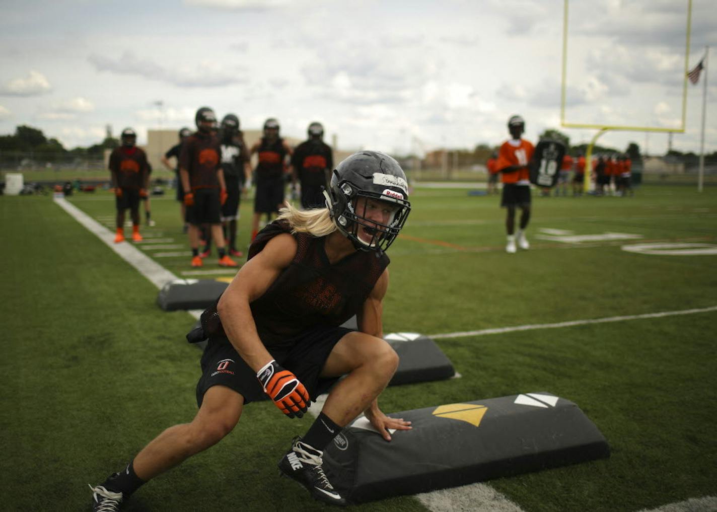 Osseo High School linebacker/safety and co-captain Nick Norman performed a drill during a 2016 practice.