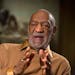 FILE - In this Nov. 6, 2014 file photo, entertainer Bill Cosby gestures during an interview at the Smithsonian's National Museum of African Art in Was