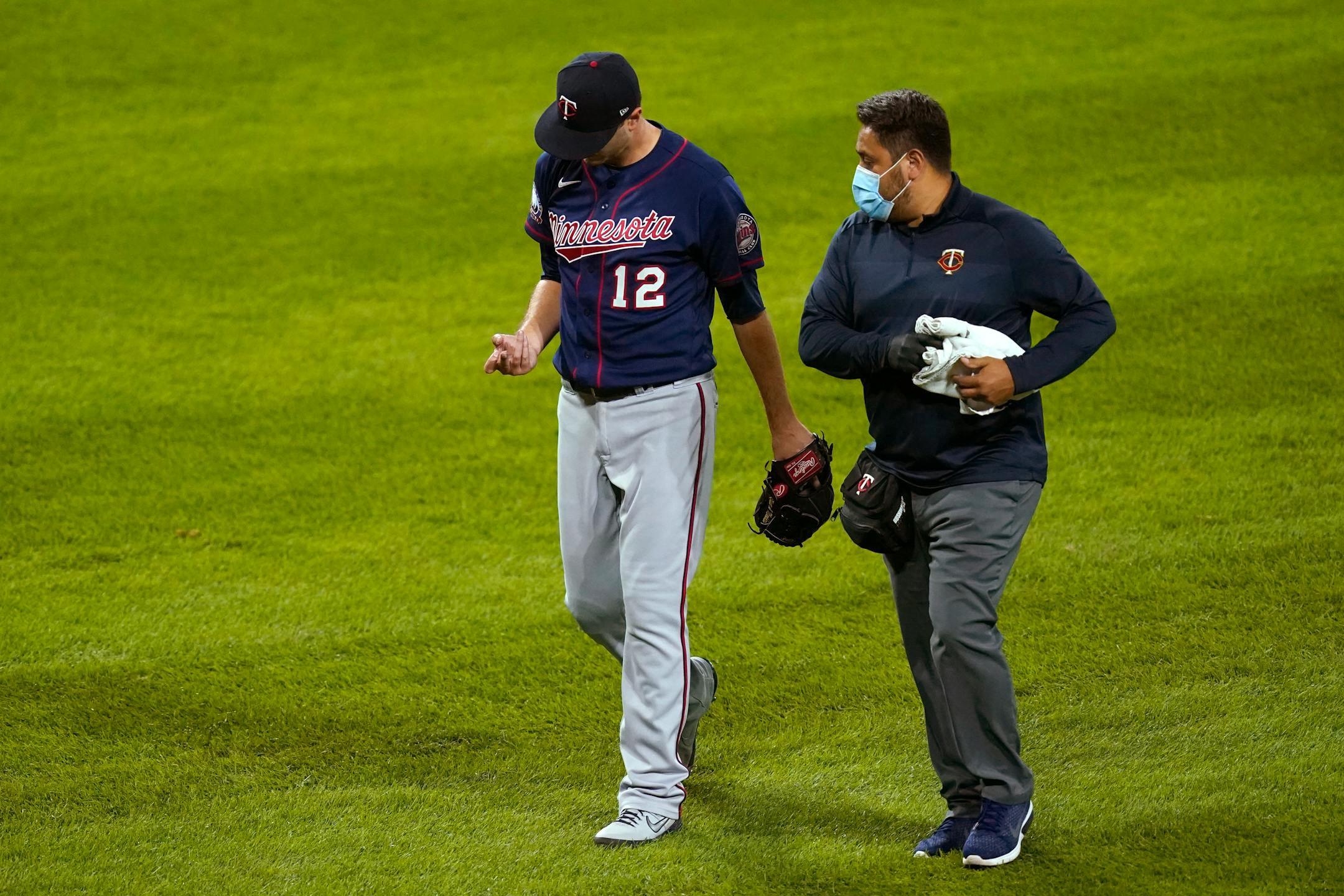 Twins starter Jake Odorizzi looked at his pitching hand as he left Wednesday's game against Chicago in the fourth inning.