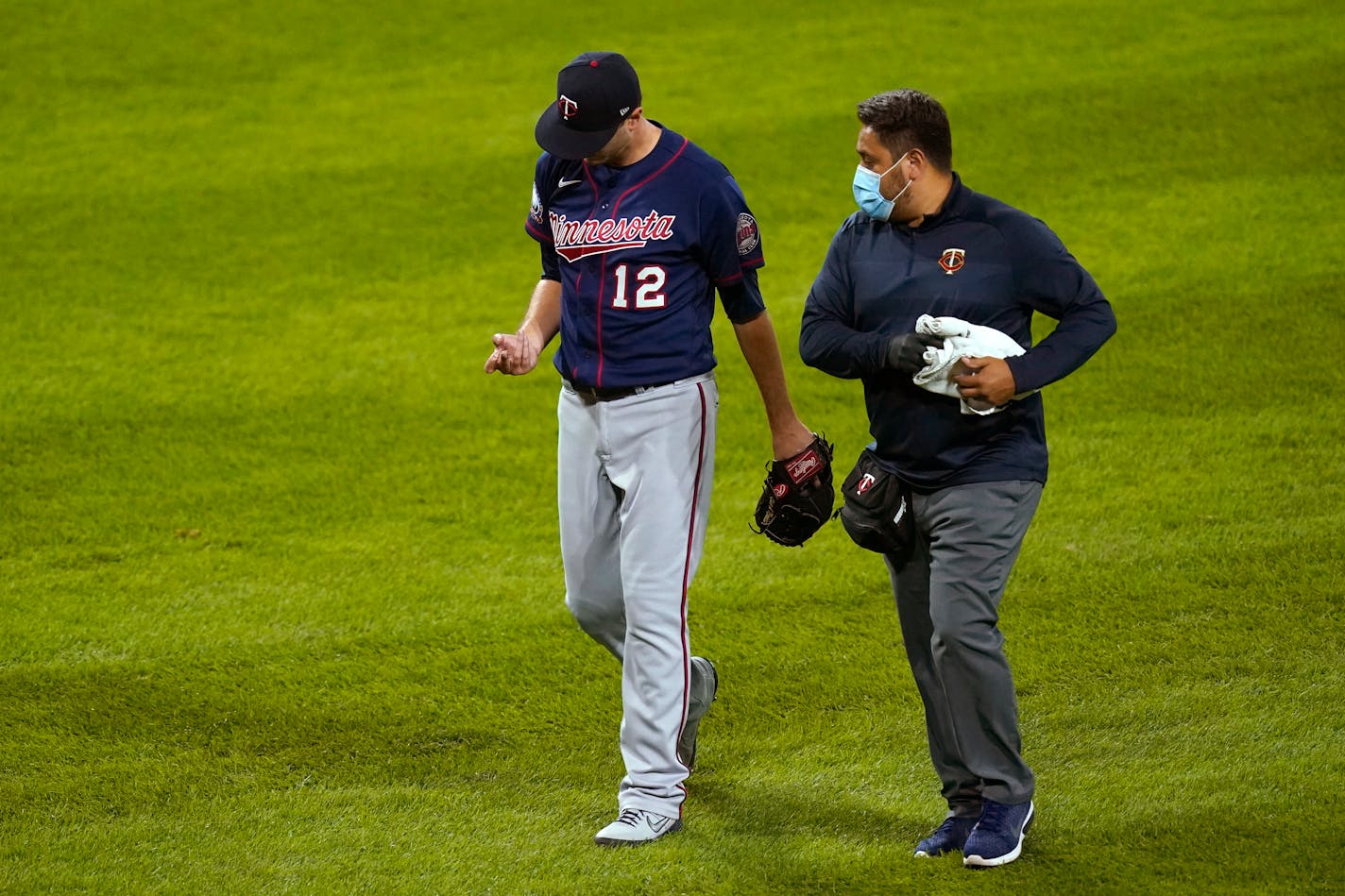 Twins starter Jake Odorizzi looked at his pitching hand as he left Wednesday's game against Chicago in the fourth inning.