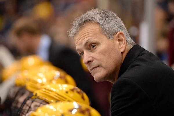 Minnesota Golden Gophers head coach Don Lucia watched the game during the third period. ] (AARON LAVINSKY/STAR TRIBUNE) aaron.lavinsky@startribune.com