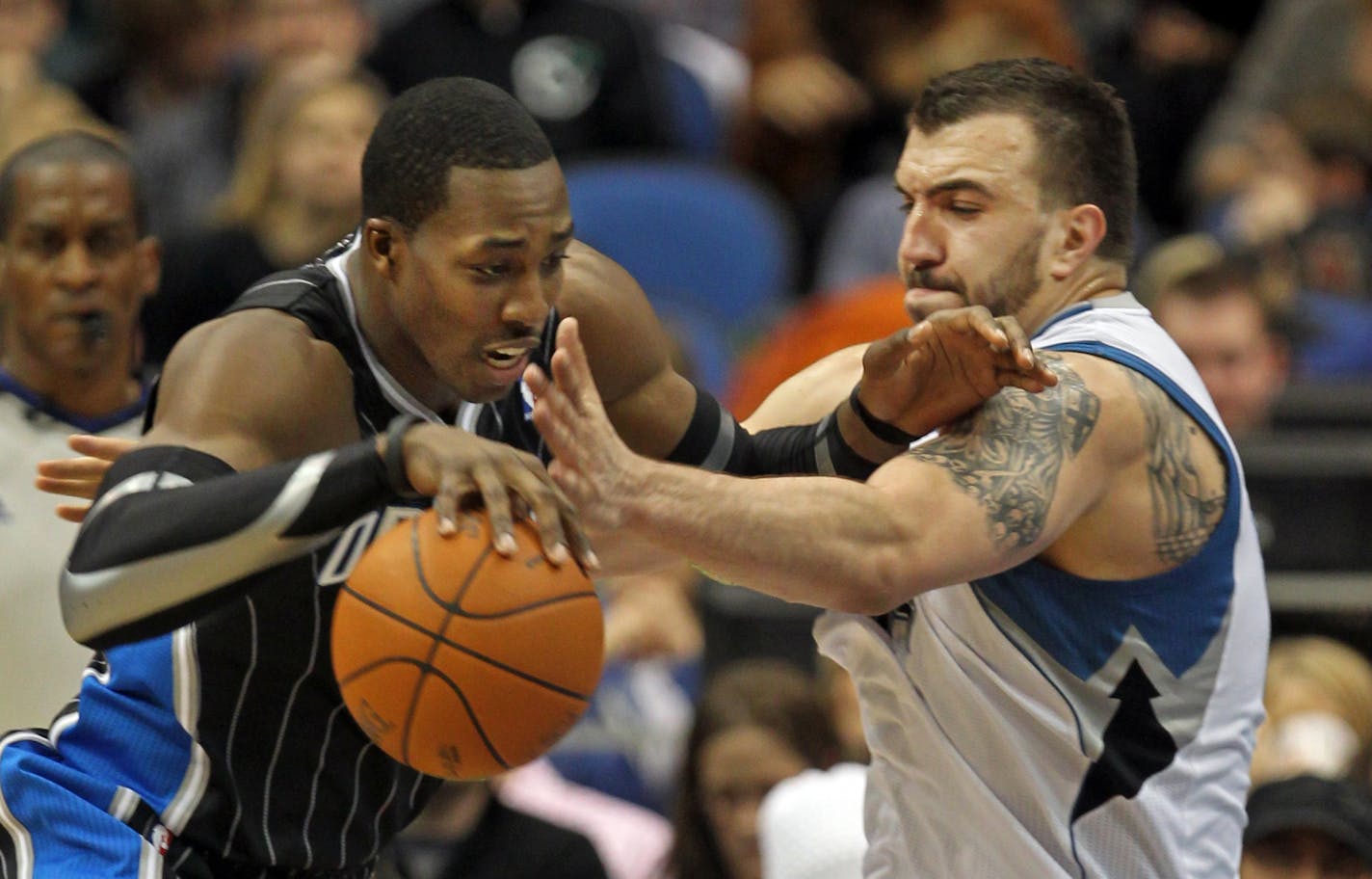 Wolves backup center Nikola Pekovic (right)