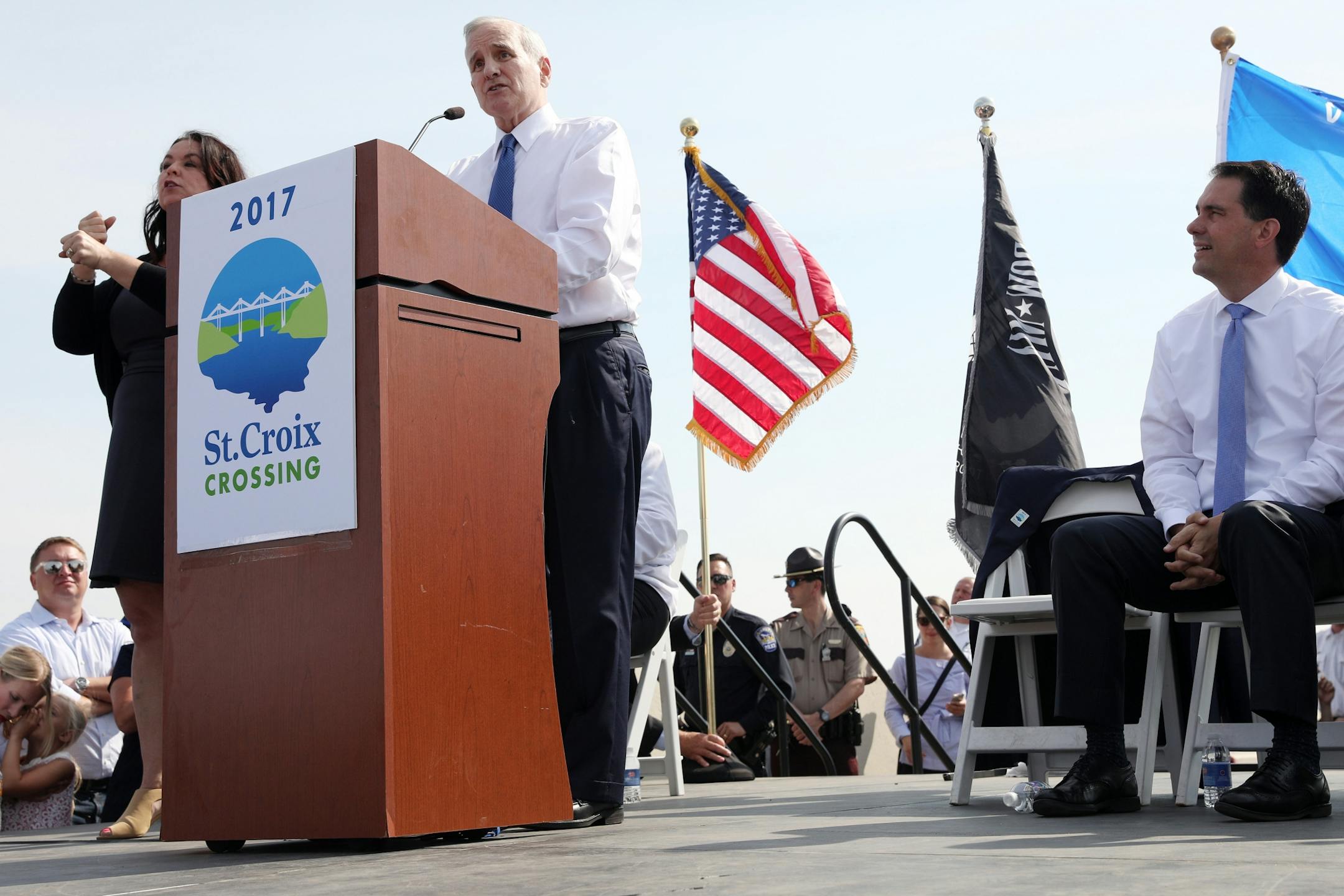 Wisconsin Gov. Scott Walker looked on as Minnesota Gov. Mark Mark Dayton talked with spoke during the ribbon-cutting ceremony.