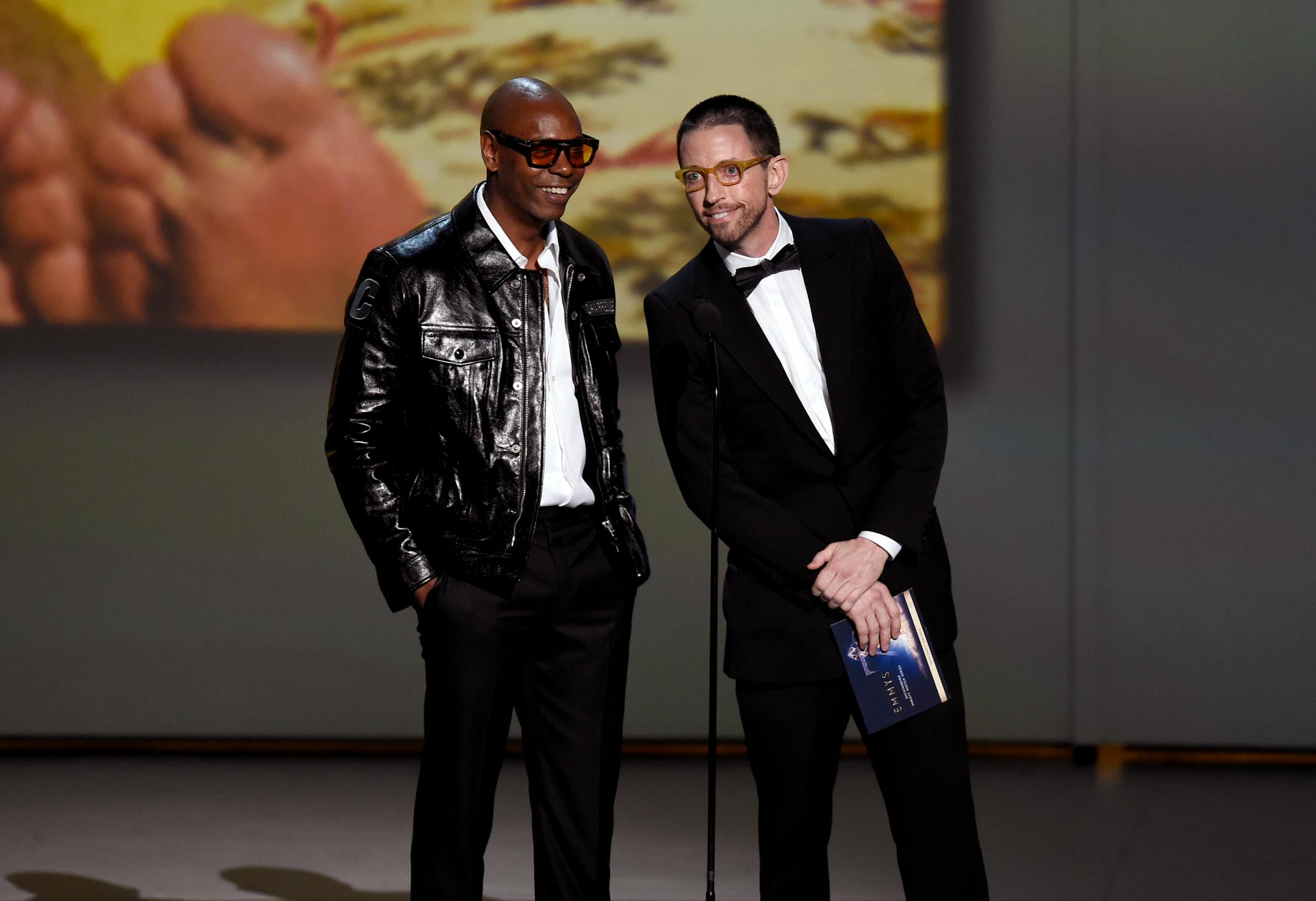 Dave Chappelle, left, and Neal Brennan present the award for outstanding variety sketch series at the 70th Primetime Emmy Awards on Monday, Sept. 17, 2018, at the Microsoft Theater in Los Angeles. (Photo by Chris Pizzello/Invision/AP)