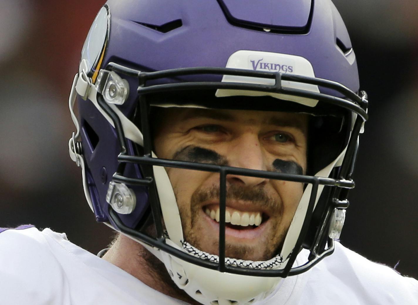 Minnesota Vikings quarterback Case Keenum celebrates a touchdown during an NFL football game against the and Washington Redskins, Sunday, Nov. 12, 2017, in Landover, Md. (AP Photo/Mark Tenally)