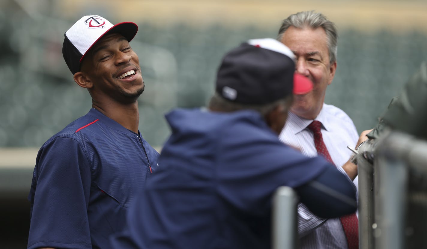 Twins' center fielder Byron Buxton shared a laugh with Tony Oliva, foreground and play-by-play announcer Dick Bremer in between his turns at batting practice at Target Field Wednesday afternoon. JEFF WHEELER &#xef; jeff.wheeler@startribune.com The Twins faced the St. Louis Cardinals Wednesday night, June 17, 2015 at Target Field in Minneapolis.