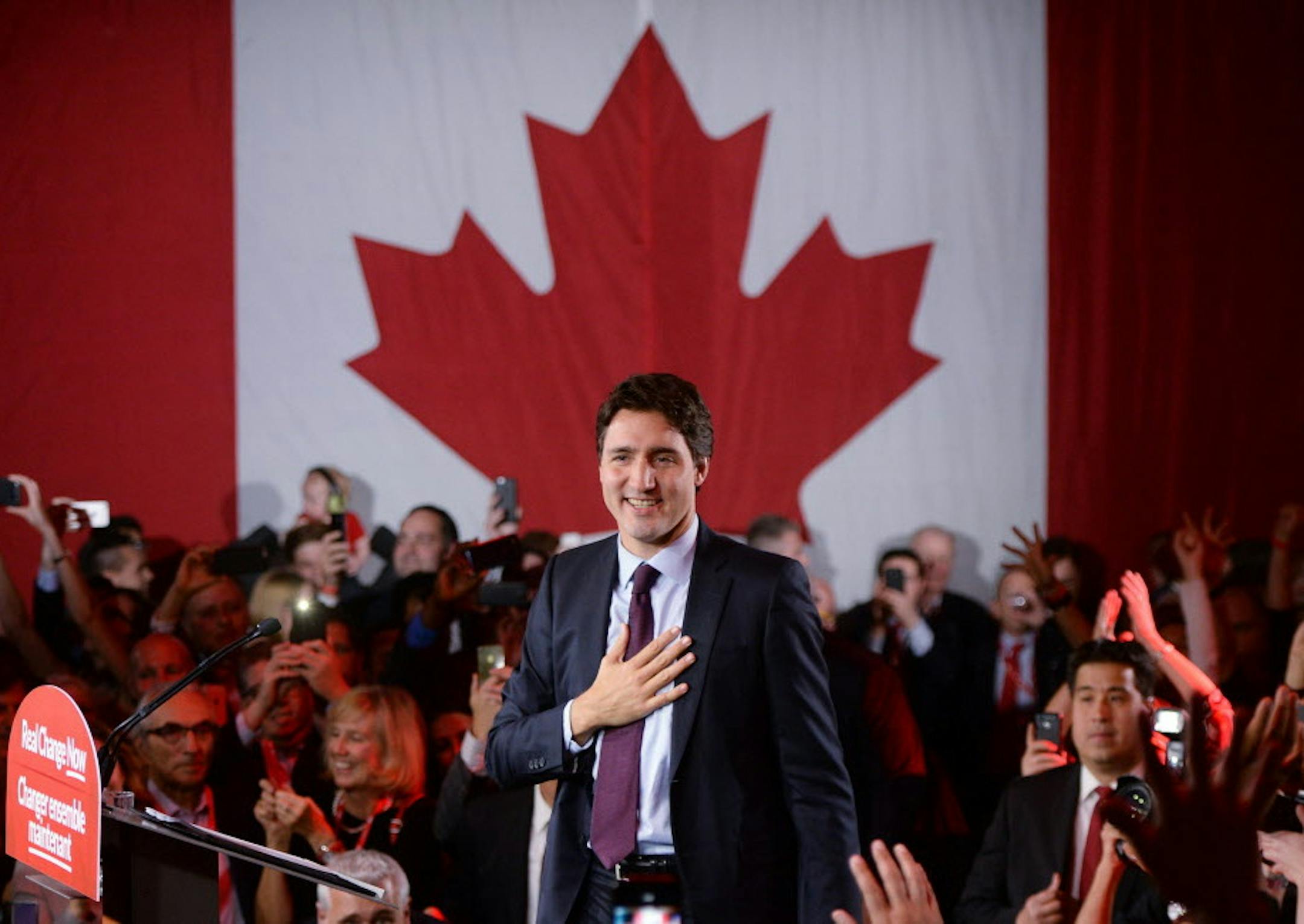Liberal leader Justin Trudeau stands on stage at the Liberal party headquarters in Montreal, Tuesday, Oct. 20, 2015. Trudeau, the son of late Prime Minister Pierre Trudeau, became Canadaís new prime minister after beating Conservative Stephen Harper. (Sean Kilpatrick/The Canadian Press via AP) MANDATORY CREDIT