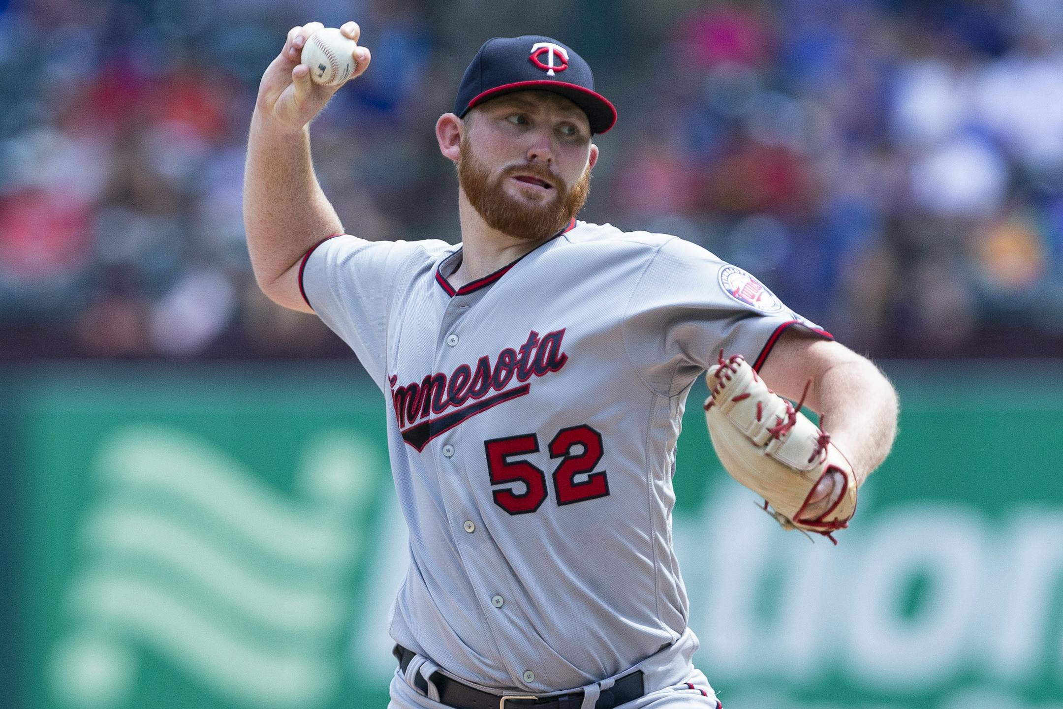 Minnesota Twins' pitcher Zack Littell (52) delivers a pitch during the fourth inning of a baseball game against the Texas Rangers, Sunday, Sept. 2, 2018, in Arlington, Texas. (AP Photo/Sam Hodde)