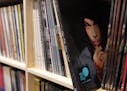 A vinyl copy of Prince's album "One Night Alone" sat among the records in Noiseland Industries' library.