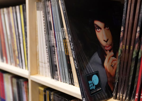 A vinyl copy of Prince's album "One Night Alone" sat among the records in Noiseland Industries' library.