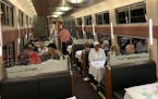 Travelers dine on the Amtrak Crescent as it rolls through Catlett, Va., on Sept. 9. MUST CREDIT: Harrison Keely