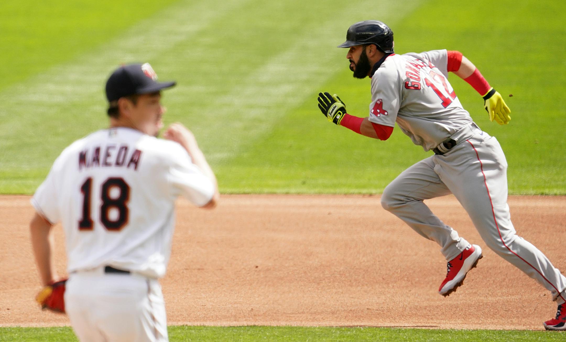 Boston Red Sox third baseman Marwin Gonzalez (12) stole second base on a wild pitch by Minnesota Twins starting pitcher Kenta Maeda (18) in the second inning.
