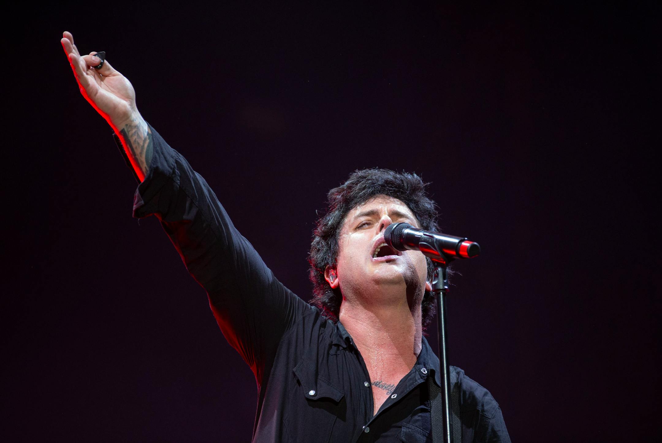 Billie Joe Armstrong, lead singer of Green Day, performed "Holiday" at the Hella Mega Tour at Target Field in Minneapolis on Monday.