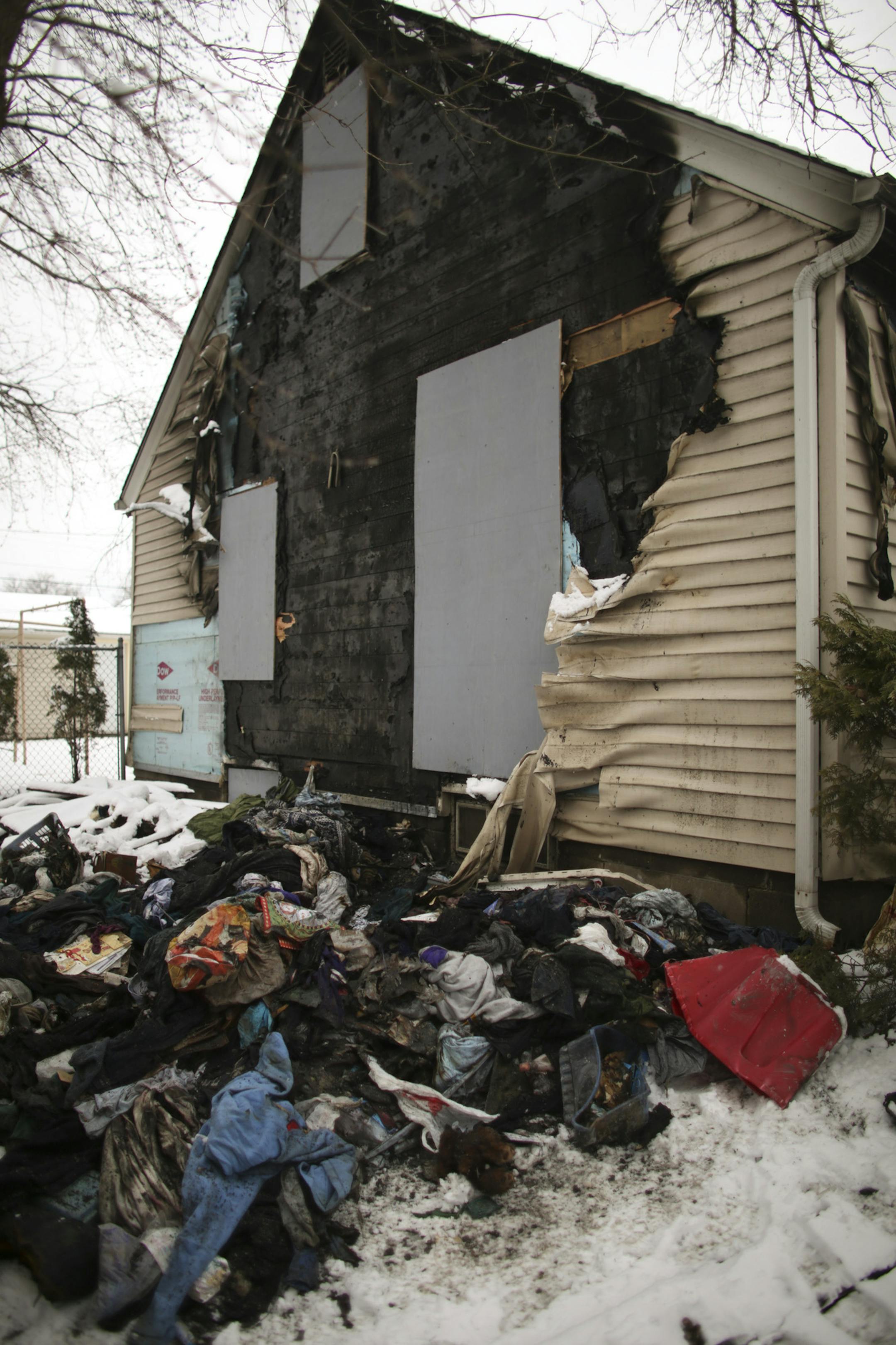 Debris from the fire that claimed the life of Renee Tollas was scattered in her yard Monday afternoon in St. Paul. ] JEFF WHEELER ï jeff.wheeler@startribune.com Co-workers of Renee Tollas, 63, were drawn to her home on Rose Ave E. in St. Paul Monday afternoon as news of her death got around. Tollas was killed in a house fire early Sunday.