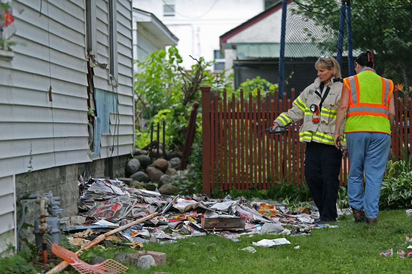 St. Paul Fire and city officials worked on the aftermath of a fatal fire on Hamline Avenue North in St. Paul on Tuesday.